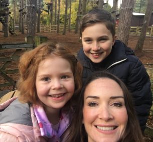 girl with mum and boy in woods