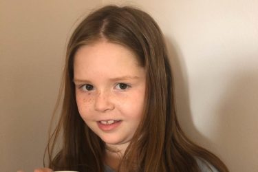 Girl holding bunny mug