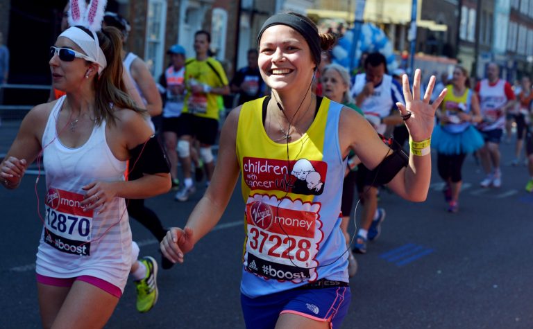 young lady running the marathon for Children With Cancer UK