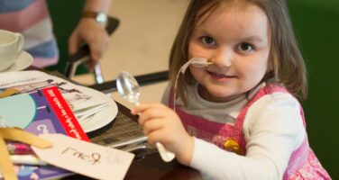 A small girl receiving treatment