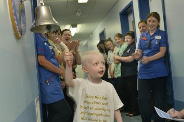 Oscar rings the end of treatment bell
