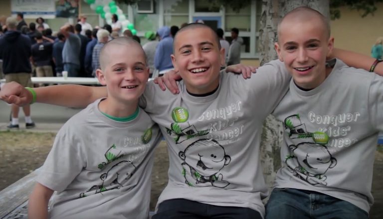 3 kids shaven heads