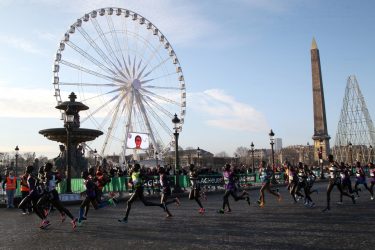 Runners taking part in the Paris Marathon