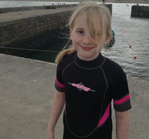 GIRL IN BLACK SWIM SUITE