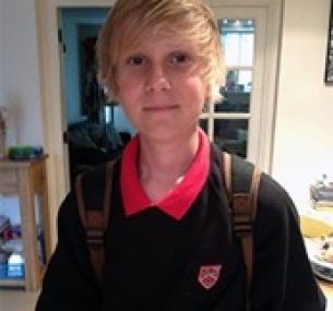 Jarvis in school uniform.