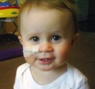 Luke smiles at the camera during his treatment.