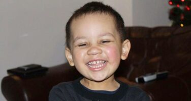 benji smiling having suffered leukemia leg pain as a child