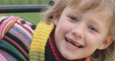 little girl smiling