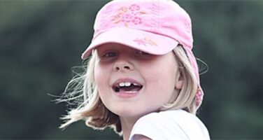 little girl with a hat