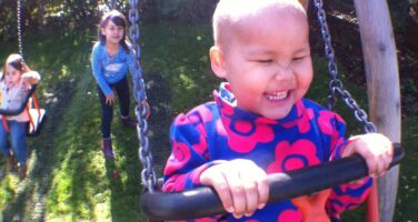 Vega enjoys going on some swings