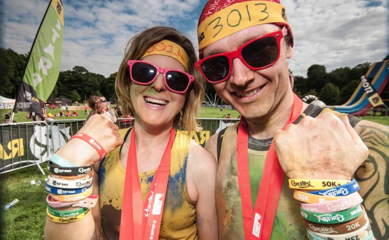 Participants showing off wristbands