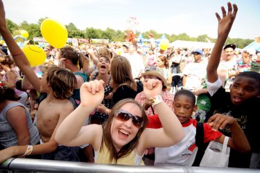 A crowd of people at a theme park