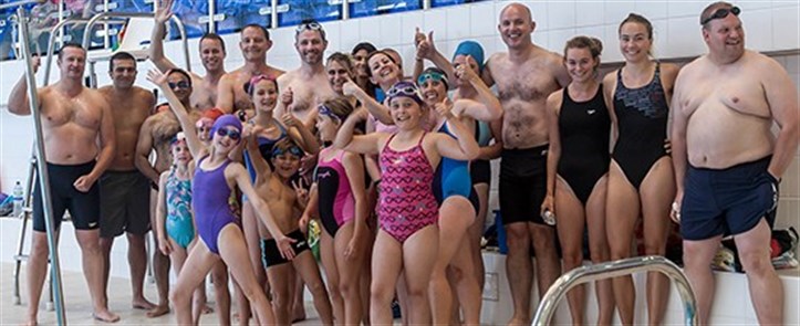 Swimming team celebrating