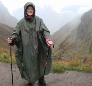 Yvonne trekking in a poncho