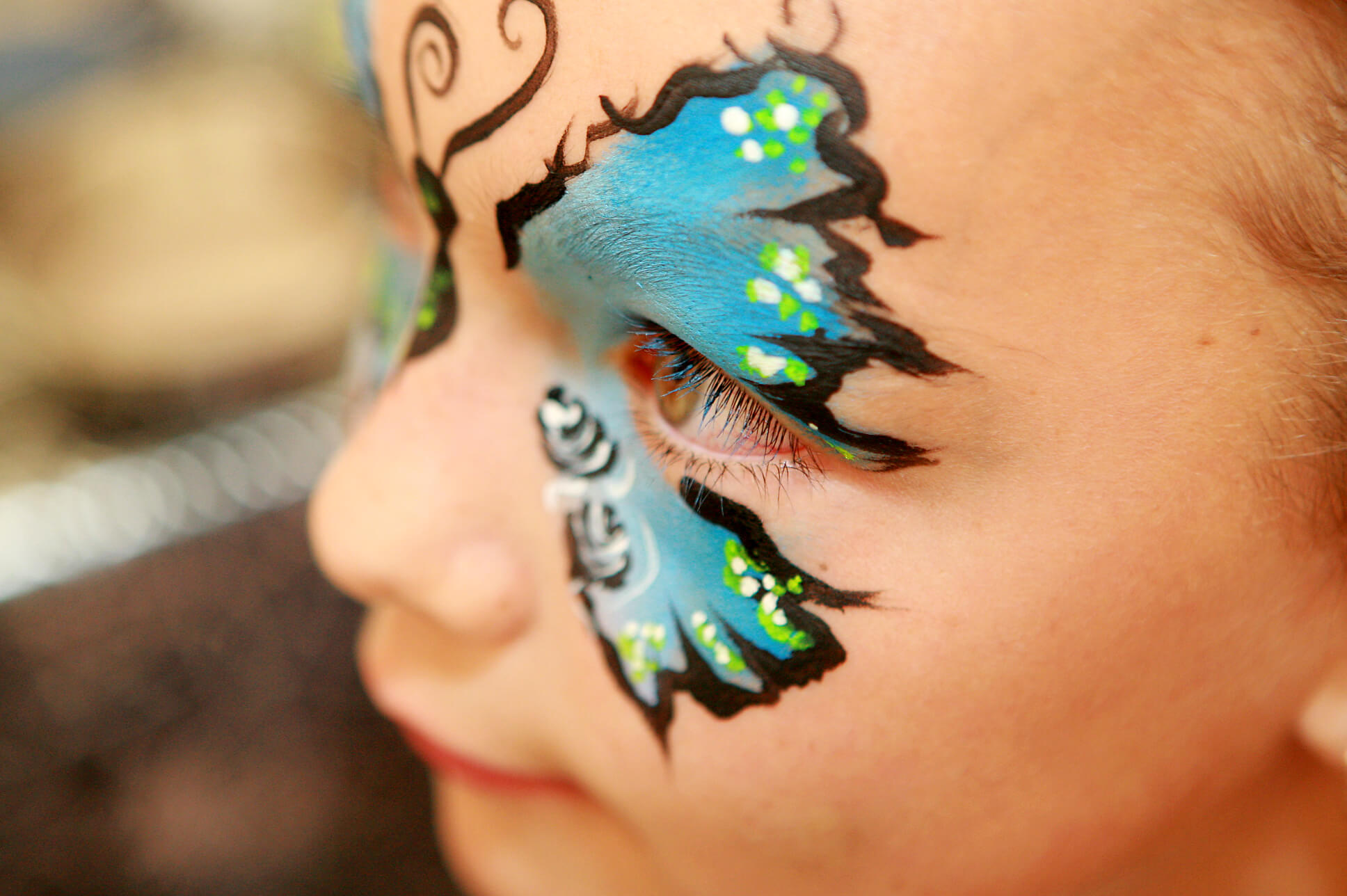 Close up of a girls face paint