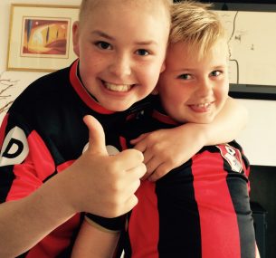 Felix and brother in AFCB Bournemouth football shirts