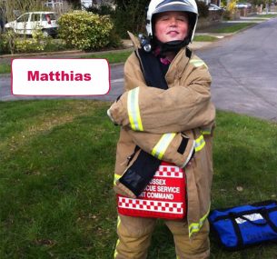 Matthias boy in fireman outfit suit