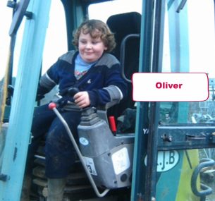 oliver boy on a digger, tractor machine