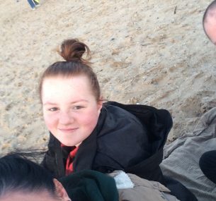 girl with mum on the beach