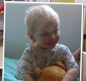 baby child holding a bear