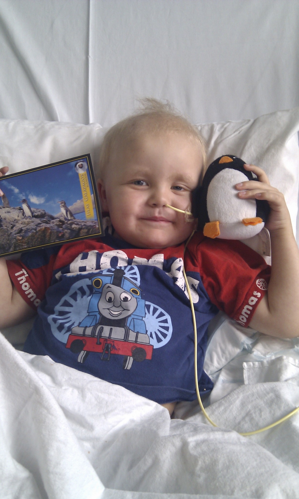 Alex in hospital with his gifts