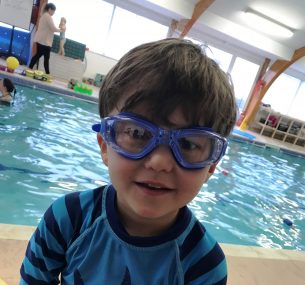 Sebastian boy in swimming goggles