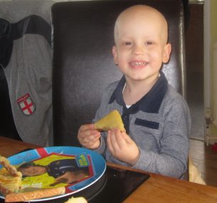 Dylan eating at the table