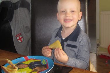 Dylan eating at the table