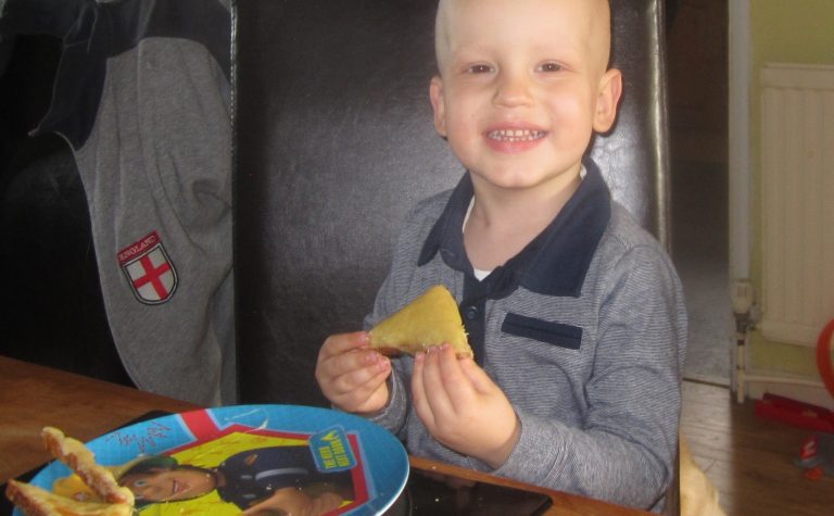 Dylan eating at the table
