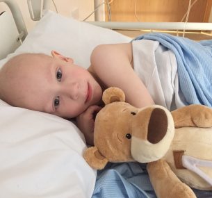 Jacob boy with teddy in bed