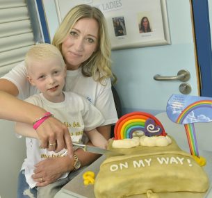 oscar boy with mum cake