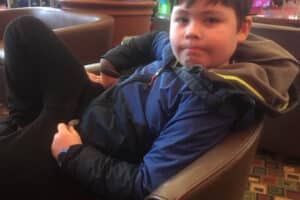 Owen sitting on chair