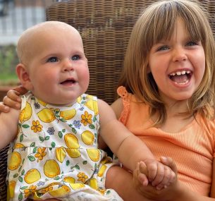 Sophia and Emilia sister wearing a dress with lemon pattern