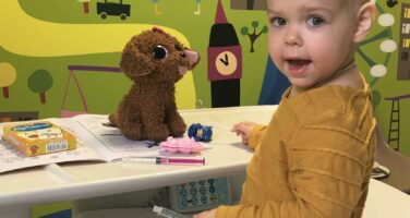 Sophie girl in brown jumper