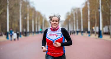 woman running in london marathon for children with cancer uk
