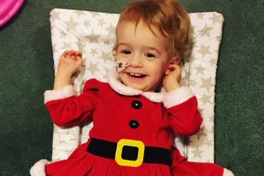 Young girl in santa costume