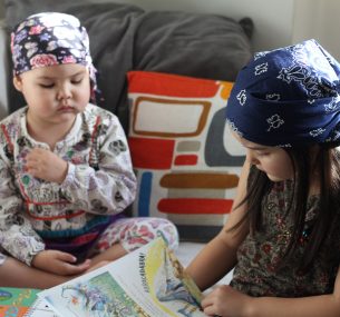 vega and her sister two girls with headbands