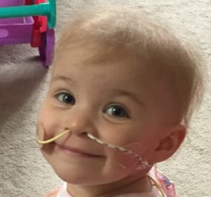 Alice 5 days after her neuroblastoma surgery