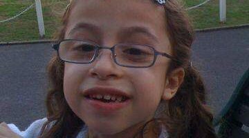 Girl with glasses and ponytail