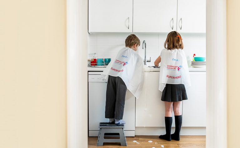 Mini Superheroes kids Washing Up by the sink