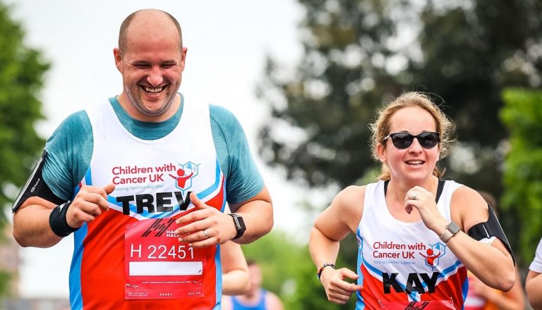 Man and woman running a half marathon for charity Kay and Trev 1