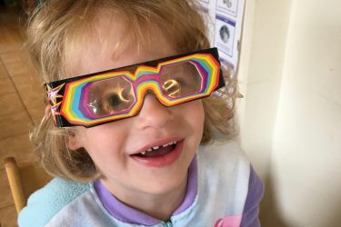 girl with 3d glasses at science party