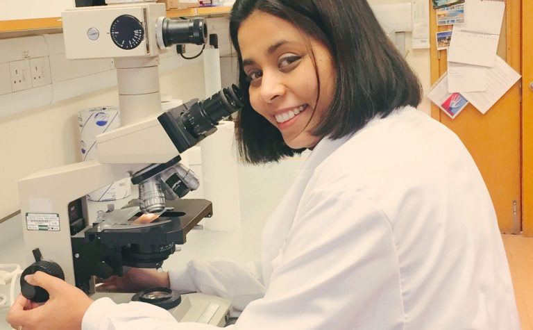 Dr Anindita Roy female researcher in white lab coat