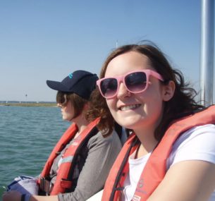 chloe sailing with sunglasses