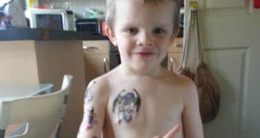 Alfie with sticker tattoos small..