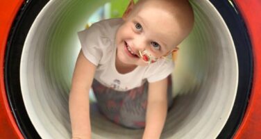 Florie smiling with nasal tube