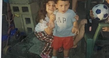 Luciano with his sister as toddlers