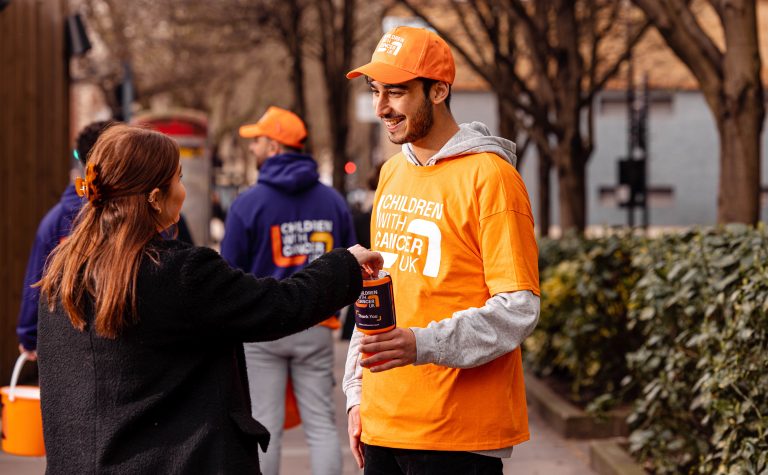 Man collecting money from a supporter