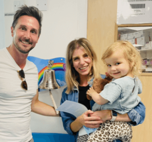 Florrie ringing end of treatment bell