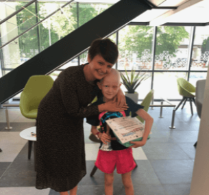 Morven hugging mum in hospital reception